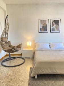 Ένα ή περισσότερα κρεβάτια σε δωμάτιο στο Casa Relax con Parcheggio e Metro