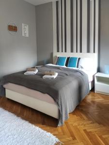 Кровать или кровати в номере Center Apartment Iva +13 фотографий
