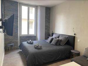 Posteľ alebo postele v izbe v ubytovaní PACA Properties 41H2 - Studio cosy