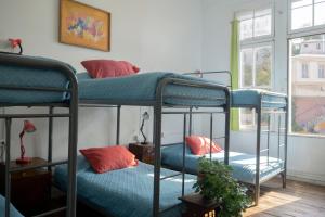 Postel nebo postele na pokoji v ubytování Casa Volante Hostal