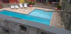 Foto dalla galleria di Flats no FORTE 200m praia ar piscinas até 8 pessoas portaria 24H a Itamaracá