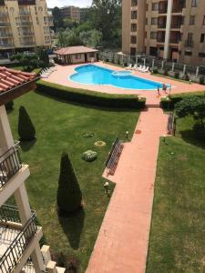 an overhead view of a swimming pool in a building at 3 Bedroom Apt with Pool Views at Arcadia Complex in Sunny Beach
