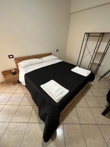 Кровать или кровати в номере Hexagon Home (intero appartamento)