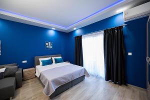 Letto o letti in una camera di Ntg Studios