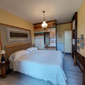 Postel nebo postele na pokoji v ubytování Agriturismo Tenuta La Fratta