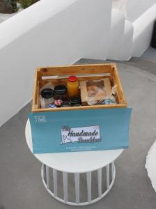 a box sitting on top of a trash can at Aidos Villa Santorini in Megalochori