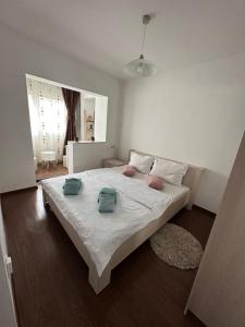 Ένα ή περισσότερα κρεβάτια σε δωμάτιο στο Class Apartments