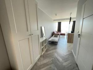 Posteľ alebo postele v izbe v ubytovaní HIGH STANDARD APARTMENT GDYNIA