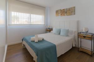 Posteľ alebo postele v izbe v ubytovaní Casa Bluebelle Guadalmina + 26 fotografií