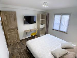 Posteľ alebo postele v izbe v ubytovaní Eco-Appart'hôtel Rouen - SLT