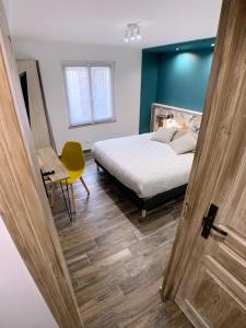 Posteľ alebo postele v izbe v ubytovaní Eco-Appart'hôtel Rouen - SLT