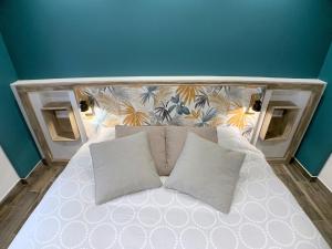 Posteľ alebo postele v izbe v ubytovaní Eco-Appart'hôtel Rouen - SLT