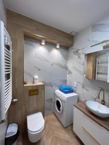 Kúpeľňa v ubytovaní Apartament Pileckiego