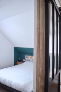 Posteľ alebo postele v izbe v ubytovaní Eco-Appart'hôtel Rouen - SLT