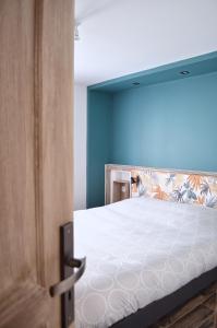Posteľ alebo postele v izbe v ubytovaní Eco-Appart'hôtel Rouen - SLT
