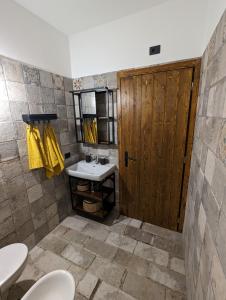 Koupelna v ubytování Antica Osteria Apartments