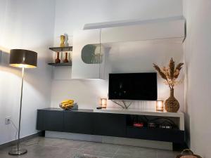 Telewizja i/lub zestaw kina domowego w obiekcie Villa Dolores