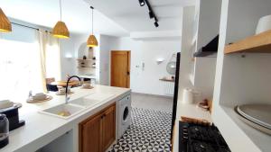 A cozinha ou kitchenette de Villa Pupputia Hammamet M'rezga beach
