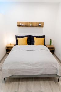 Postel nebo postele na pokoji v ubytování The Central Border Premium Apartment