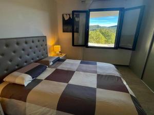 Uma cama ou camas num quarto em Cœur de provence