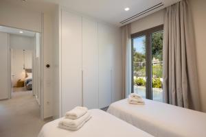 Postel nebo postele na pokoji v ubytování Stablo Residence + 137 fotografií