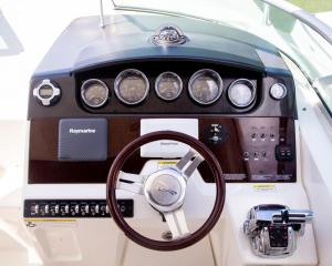 a dashboard of a car with a steering wheel at Yacht Cancun Rent & Tours in Cancún