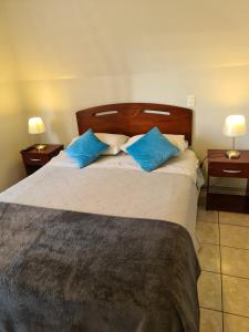 Ένα ή περισσότερα κρεβάτια σε δωμάτιο στο Frente Al Parque Arauco