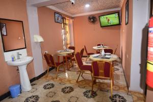 Μια τηλεόραση ή/και κέντρο ψυχαγωγίας στο BETTER LIFE HOTEL KASULU