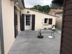 Balkón nebo terasa v ubytování Saint Vivien de Médoc: jolie maison médocaine
