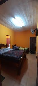 Cama ou camas em um quarto em El Shaddai