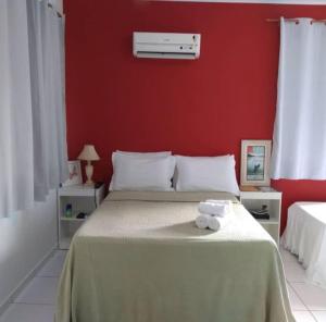 Ένα ή περισσότερα κρεβάτια σε δωμάτιο στο Apartamento Alto Mucugê