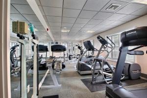 a gym with treadmills and elliptical machines at 1B/1B condo with Ocean views, Resort style, Free WIFI, Few steps to the Beach!! in Wildwood Crest