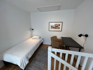 Postel nebo postele na pokoji v ubytování Stugcentralen Lägenhetshotell & Stugor