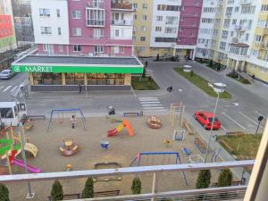 an aerial view of a playground in a city at Brown Aparts in Chişinău