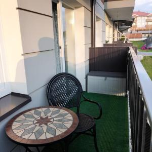 Balkón alebo terasa v ubytovaní Apartament Słoneczny 2
