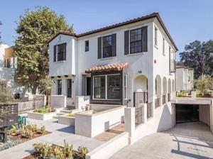a large white house with black windows at Charming 3B3B Townhome (Relax & Family Friendly) in Pasadena