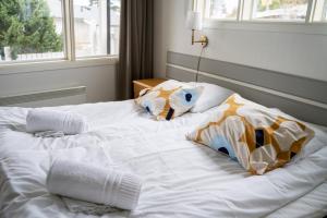 Postel nebo postele na pokoji v ubytování Spa Hotel Kasnäs