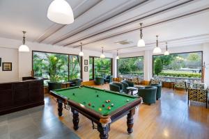 a billiard room with a pool table at Anandam - A Luxury Resort in Udaipur in Udaipur