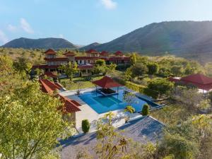 an aerial view of a resort with a swimming pool at Anandam - A Luxury Resort in Udaipur in Udaipur