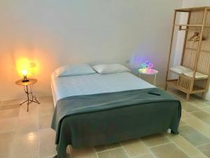 Katil atau katil-katil dalam bilik di Casa Olivetto