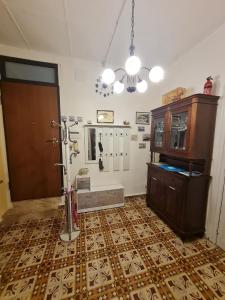 a room with a bathroom with a door and a floor at Casa sul Corso in Trapani