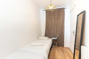 Posteľ alebo postele v izbe v ubytovaní 147 - Urban Cosy Flat in Paris + 6 fotografií