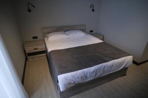 Postel nebo postele na pokoji v ubytování Vip Avtim hotel