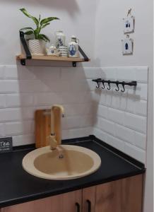 Ванная комната в 3-Bedroom and 1-bedroom Apartments in Kobuleti