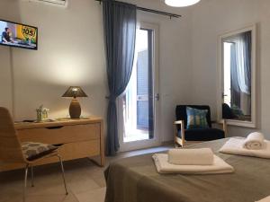 TV a/nebo společenská místnost v ubytování Odegos Mono & Trilo