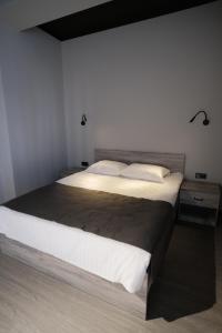 Postel nebo postele na pokoji v ubytování Vip Avtim hotel