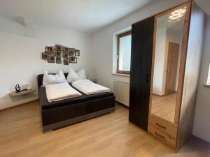 Voodi või voodid majutusasutuse Haus zum Glück toas