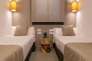 Alidreams Lola Center Apartamentos客房内的一张或多张床位