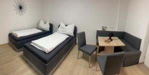 Voodi või voodid majutusasutuse Haus zum Glück toas