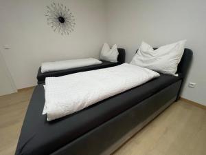 Voodi või voodid majutusasutuse Haus zum Glück toas